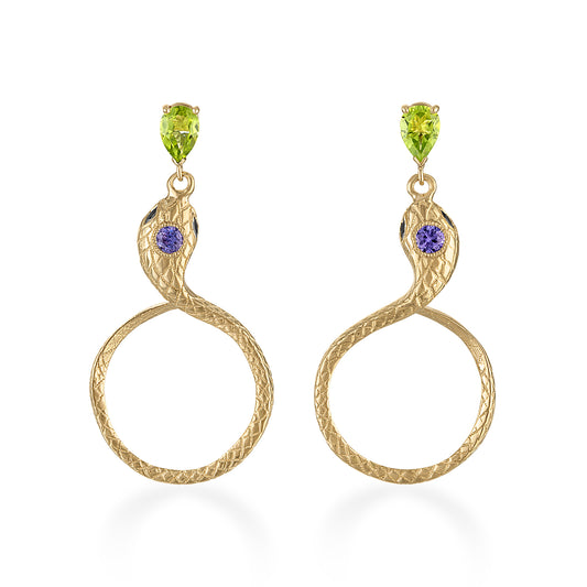 Gold snake-shaped earrings with green and purple gemstones on a white background
