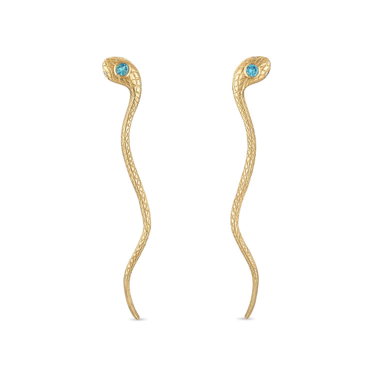 A pair of 14k gold snake earrings with engraved scales, milgrain bezel set teal green sapphire head stones and diamond eye stones. The earrings are single piece snake head post back studs with the long tails dropping down.