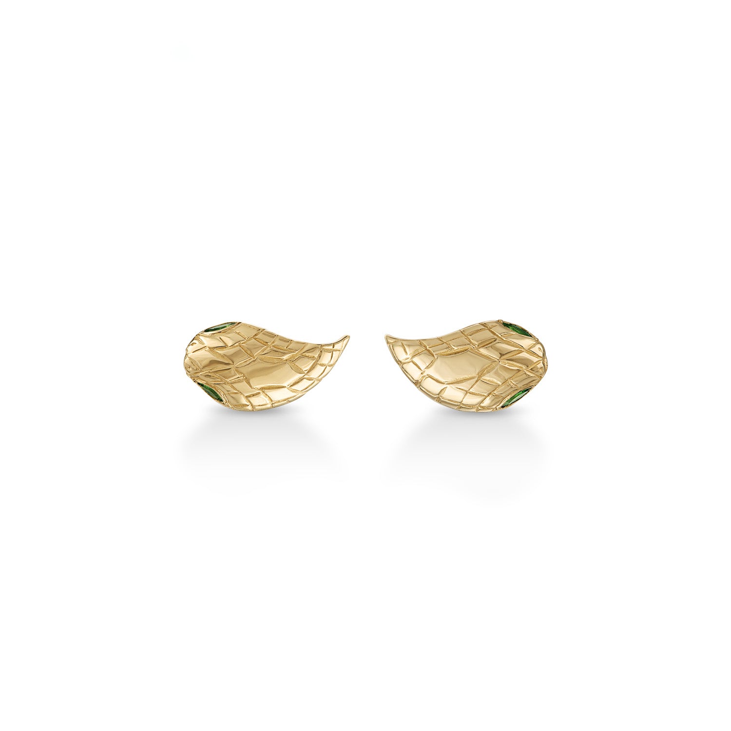 A pair of teardrop-shaped 14k gold snake head stud earrings with engraved scales and inset green marquise cut eye stones with milgrain detail.